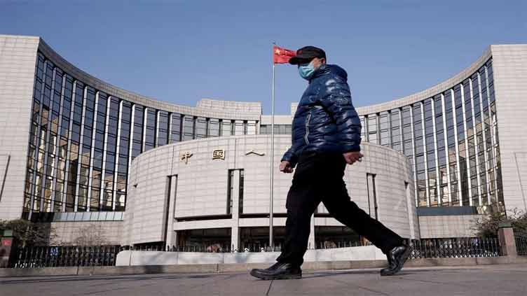 China's central bank cuts two key rates to boost economy