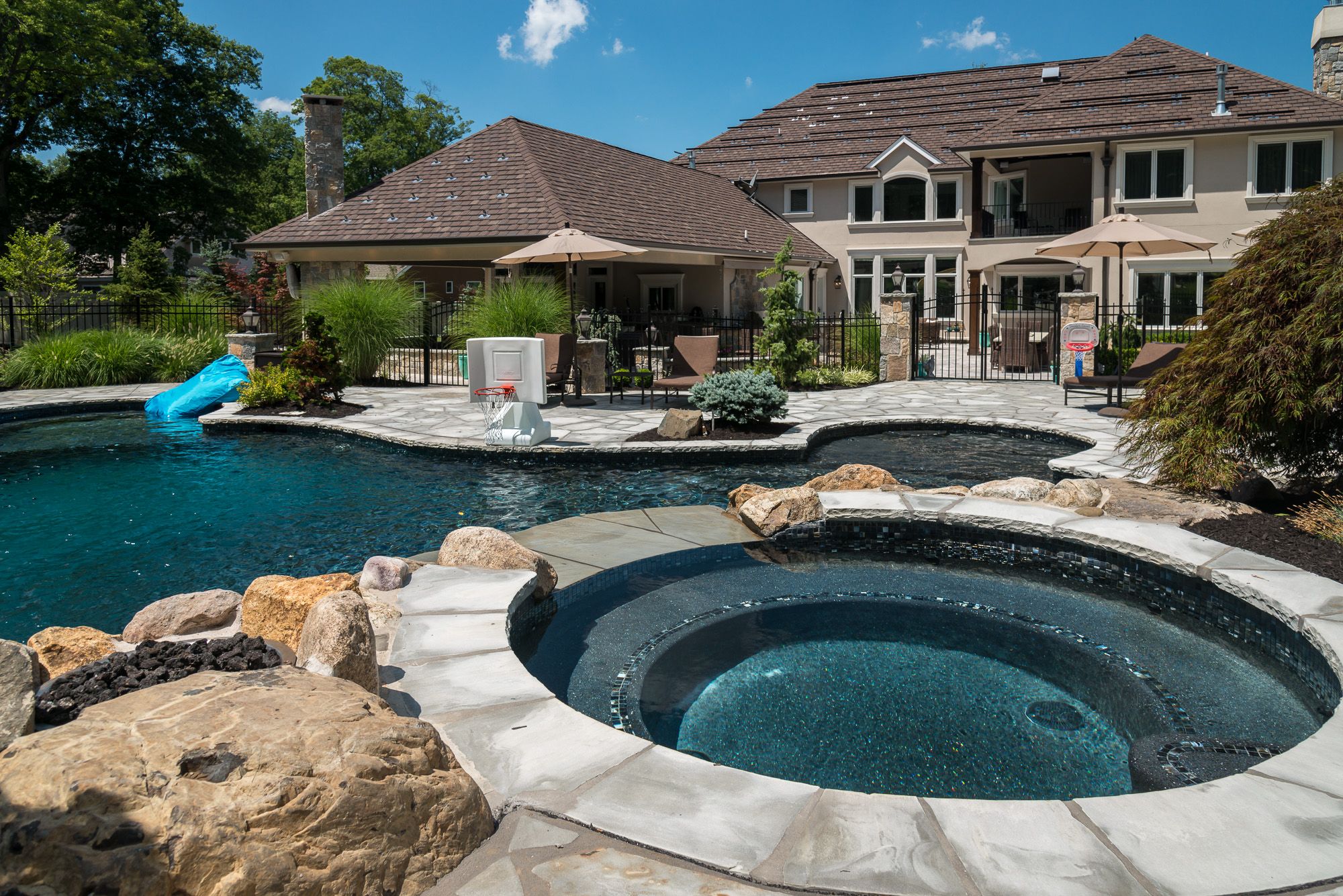 Pool Designer Transforms Modest Home Into Tranquil Oasis